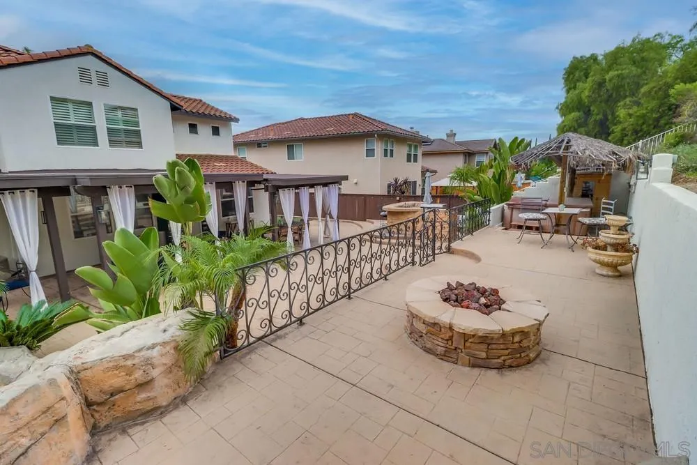 2567 View Trail Court Chula Vista, CA 91914 - Photo 44 of 55 a view of a house with a chairs and a table