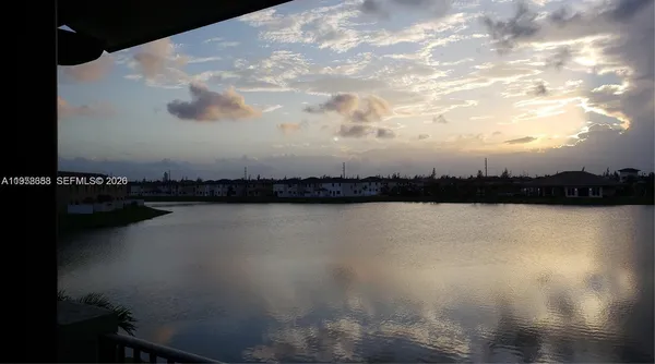 a view of a lake with a city