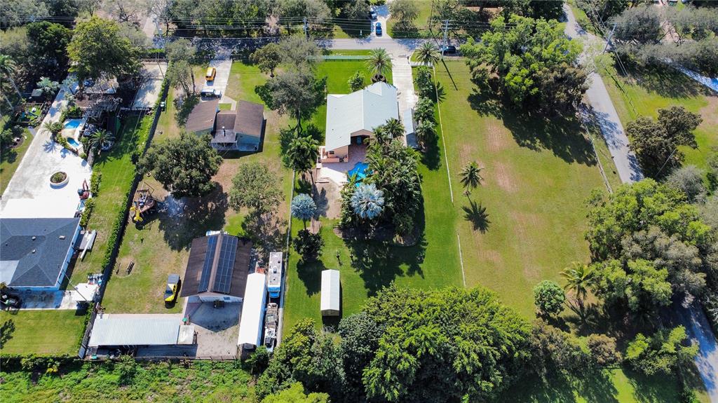 14481 Southwest 20th Street Davie, FL 33325 - Photo 12 of 36 an aerial view of a house with a garden and swimming pool