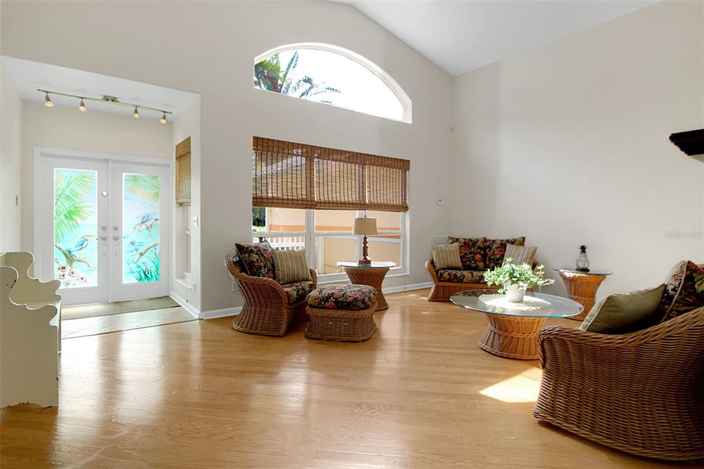 14481 Southwest 20th Street Davie, FL 33325 - Photo 17 of 36 a living room with furniture and a large window