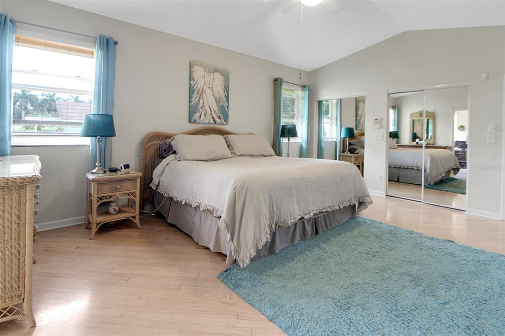 14481 Southwest 20th Street Davie, FL 33325 - Photo 24 of 36 a spacious bedroom with a bed and a couch