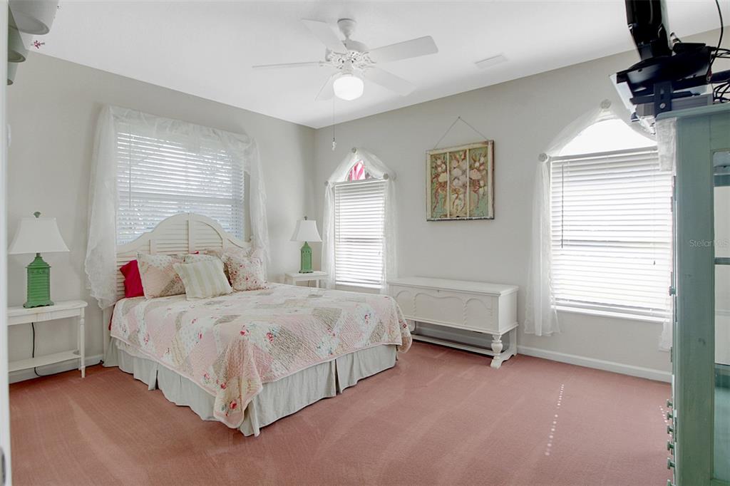 14481 Southwest 20th Street Davie, FL 33325 - Photo 31 of 36 a bedroom with a bed and a window
