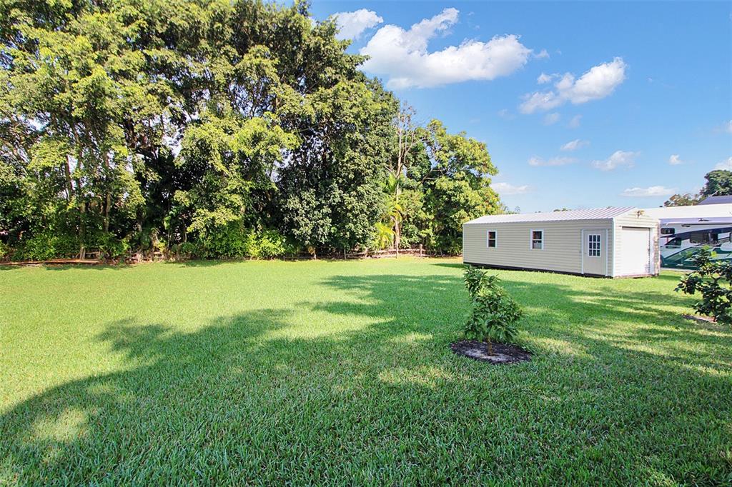 14481 Southwest 20th Street Davie, FL 33325 - Photo 35 of 36 a view of a house with a yard