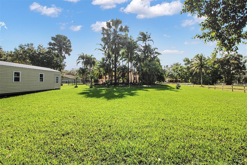 14481 Southwest 20th Street Davie, FL 33325 - Photo 36 of 36 a view of a field with grass and trees