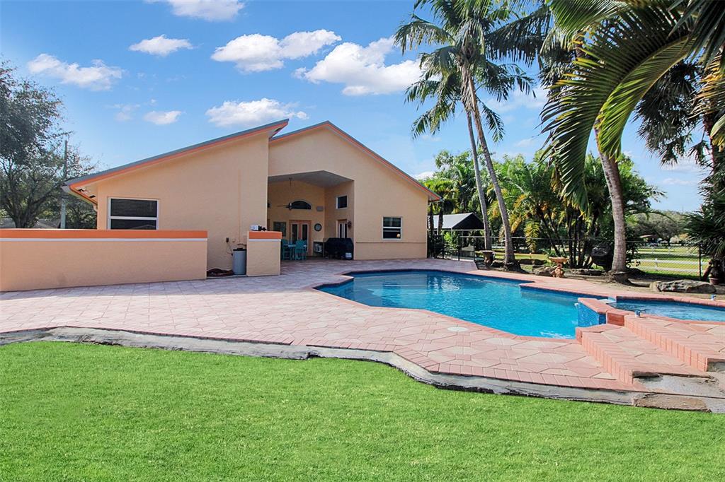 14481 Southwest 20th Street Davie, FL 33325 - Photo 6 of 36 a view of outdoor space yard and swimming pool