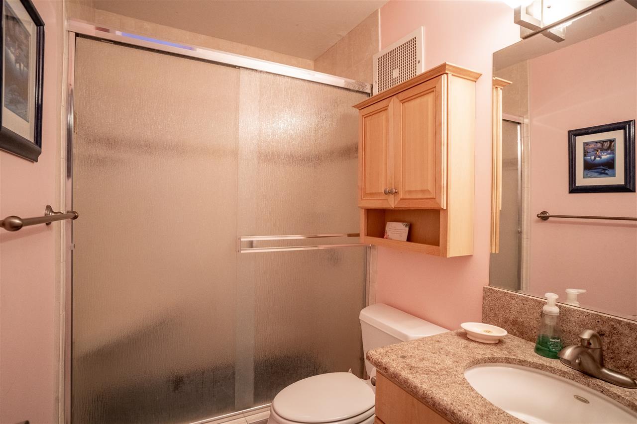 998 South Kihei Road, Unit 304 Kihei, HI 96753 - Photo 19 of 26 a bathroom with a granite countertop sink toilet and shower