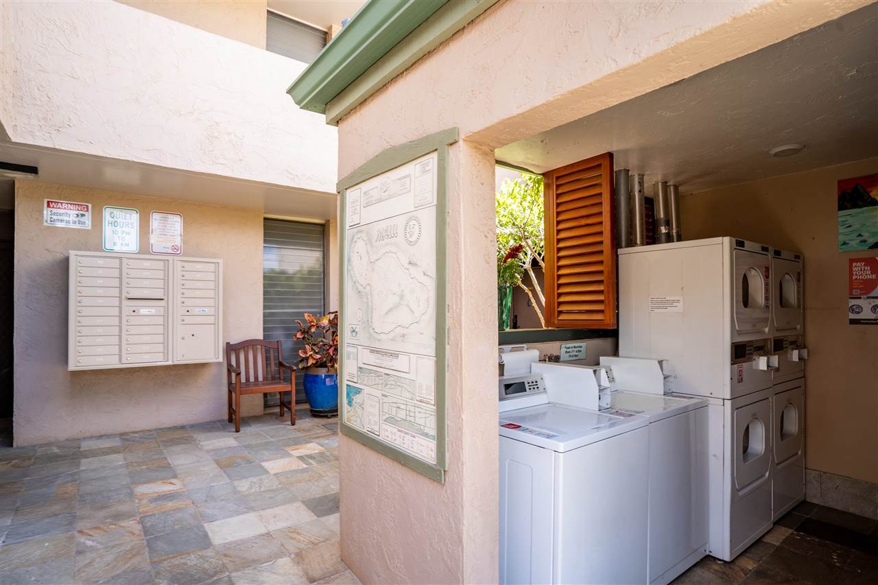 998 South Kihei Road, Unit 304 Kihei, HI 96753 - Photo 24 of 26 a bathroom with a sink a mirror and a shower
