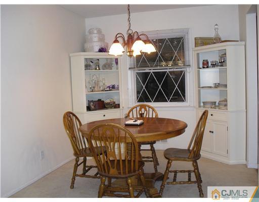 5 Laythan Road Edison, NJ 08817 - Photo 4 of 11 a dining room with furniture and window