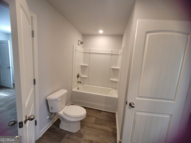 502 Holsteiner Road, Unit 62 Hogansville, GA 30230 - Photo 8 of 14 a bathroom with a toilet and a shower