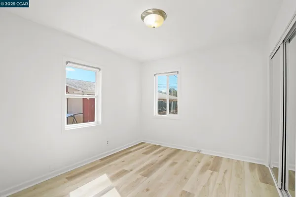 a view of a bedroom with a window