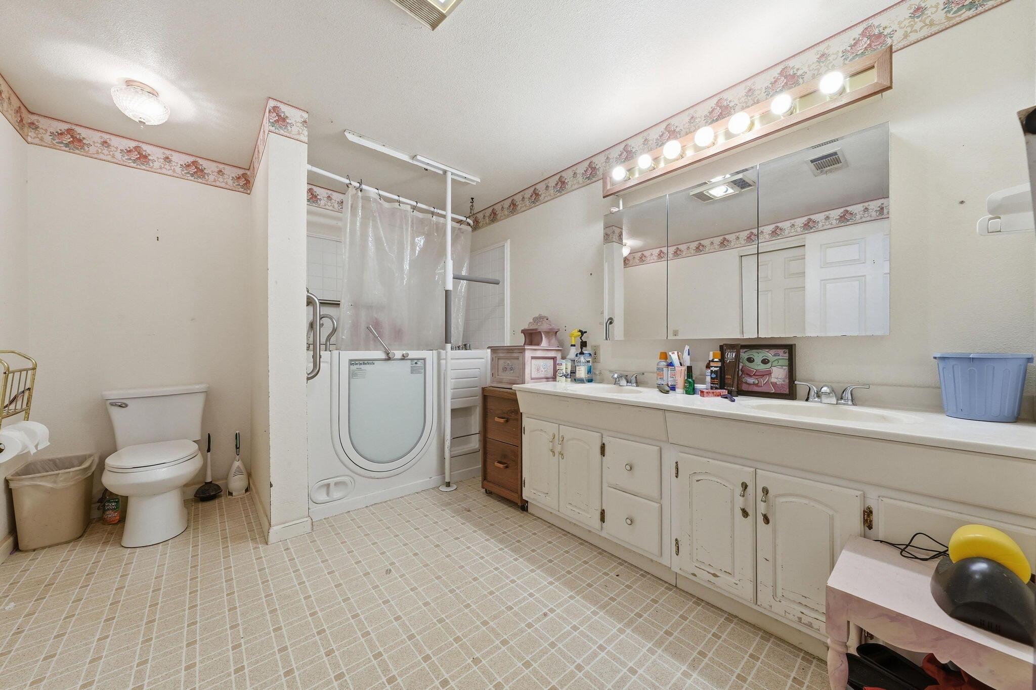 22189 Old Alturas Road Redding, CA 96003 - Photo 21 of 70 a spacious bathroom with a double vanity sink mirror and toilet