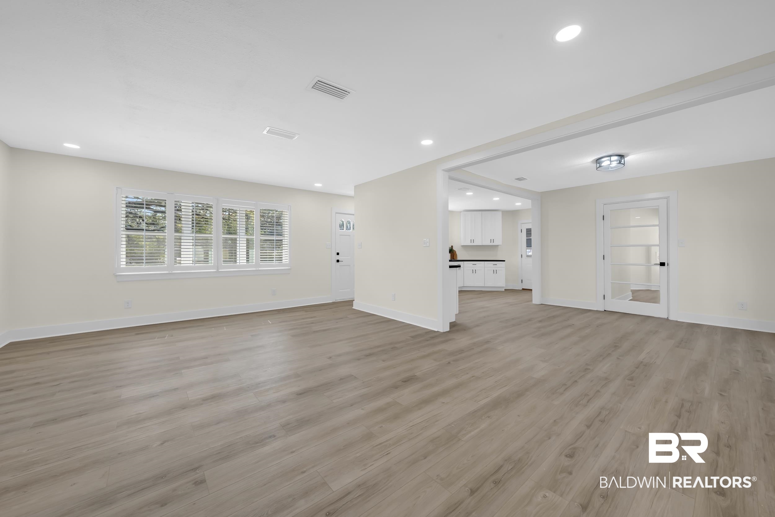 1409 Altair Lane Mobile, AL 36693 - Photo 6 of 23 Unfurnished living room featuring light wood-style floors and recessed lighting