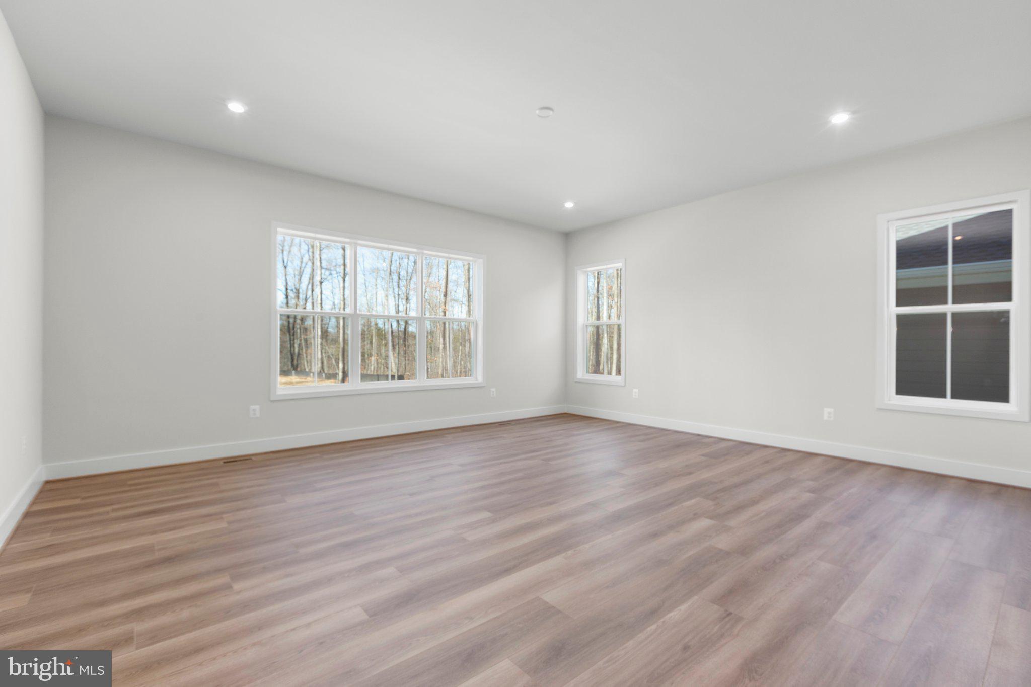 10 Burwell Road Nokesville, VA 20181 - Photo 27 of 57 wooden floor in an empty room with a window