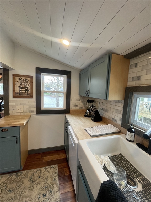 134 Kibbe Road Otis, MA 01029 - Photo 15 of 42 a room with a white furniture a sink a window and stainless steel appliances