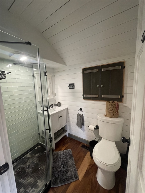 134 Kibbe Road Otis, MA 01029 - Photo 20 of 42 a bathroom with a toilet a sink and a mirror