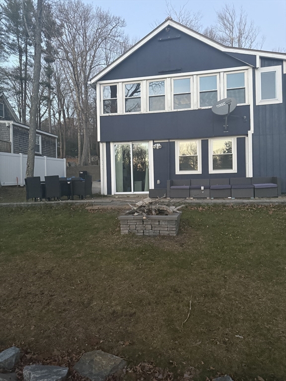 134 Kibbe Road Otis, MA 01029 - Photo 2 of 42 a front view of a house with a yard