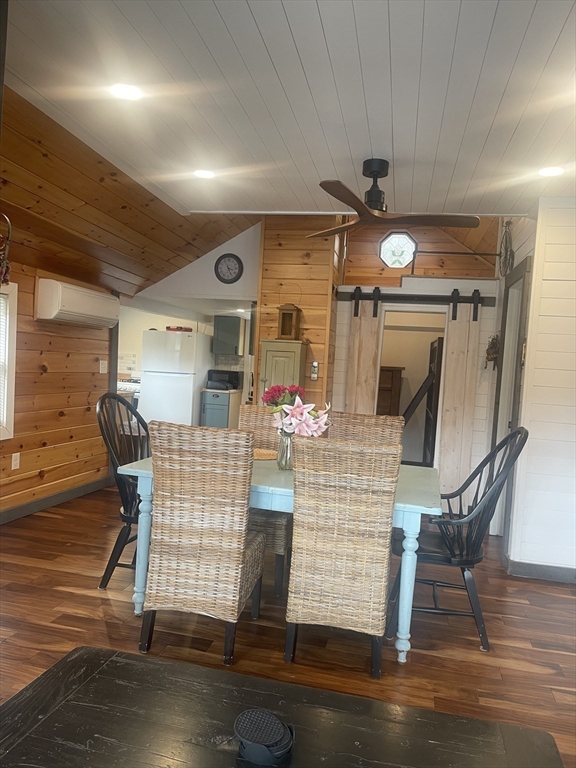 134 Kibbe Road Otis, MA 01029 - Photo 32 of 42 a view of dining room with furniture and wooden floor