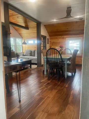 a kitchen with a sink and wooden cabinets