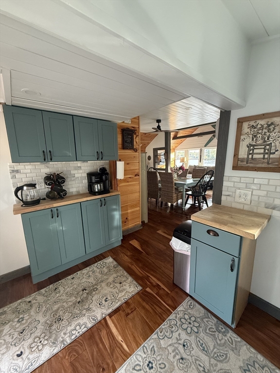 134 Kibbe Road Otis, MA 01029 - Photo 34 of 42 a kitchen with a sink and wooden cabinets