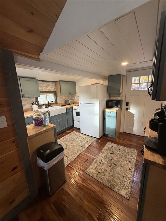 134 Kibbe Road Otis, MA 01029 - Photo 37 of 42 a room with kitchen island granite countertop furniture and a fireplace