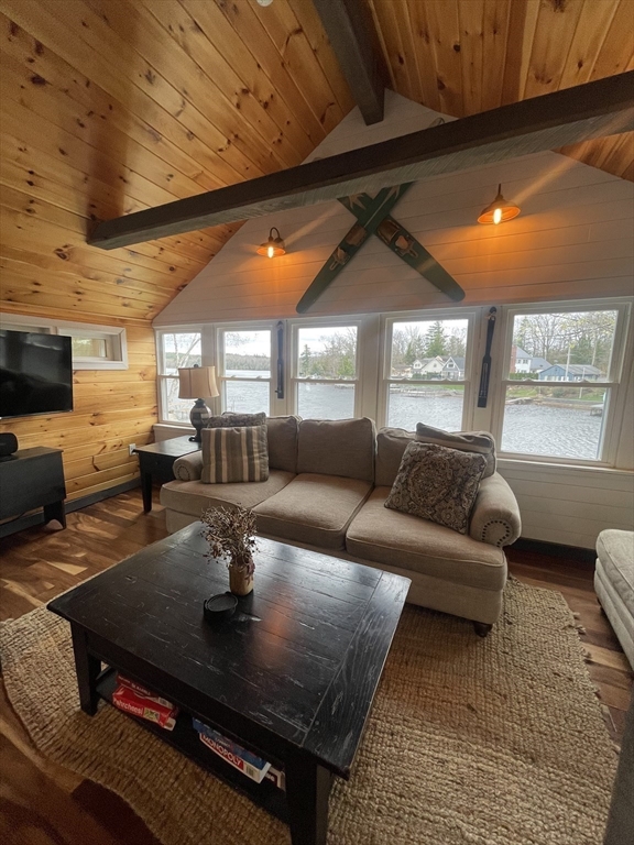 134 Kibbe Road Otis, MA 01029 - Photo 8 of 42 a living room with furniture and a large window