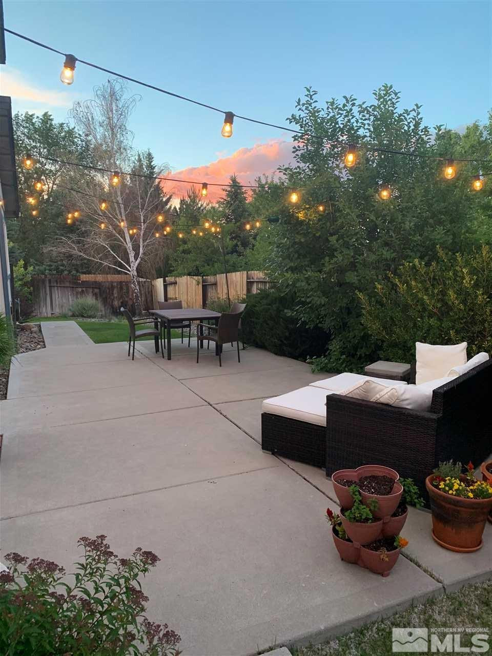 40 Ghost Rider Court Reno, NV 89511 - Photo 24 of 27 a terrace view with sitting space and garden