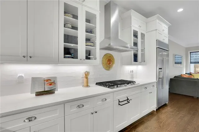 a living room with furniture or couches and a large window