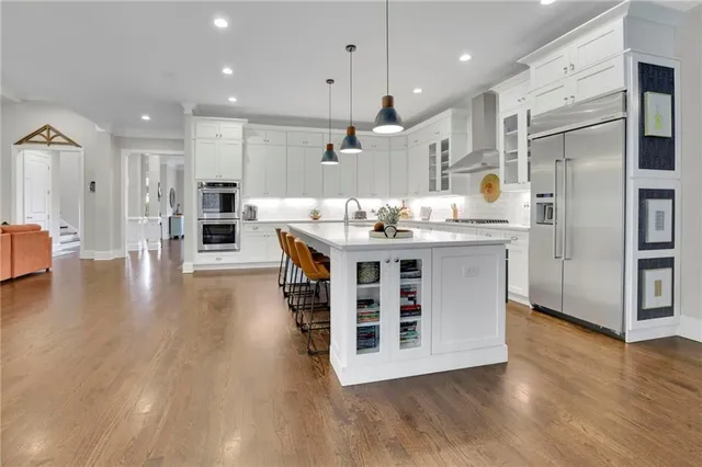 a living room with furniture fireplace and flat screen tv