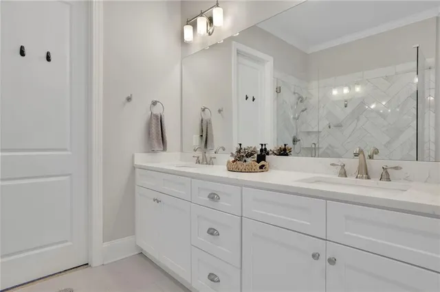 a bedroom with bed and window