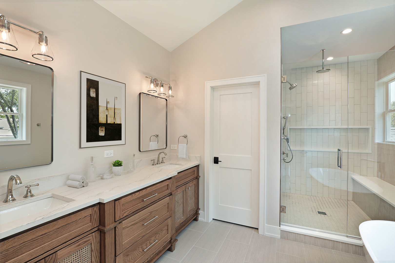 1060 Cedar Lane Northbrook, IL 60062 - Photo 14 of 31 a bathroom with a double vanity sink mirror double shower and a mirror