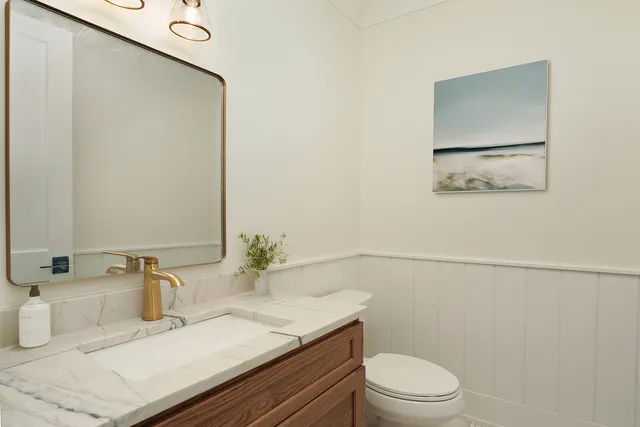 a kitchen with a table and chairs in it