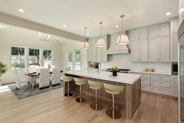 a bathroom with a double vanity sink mirror double shower and a mirror