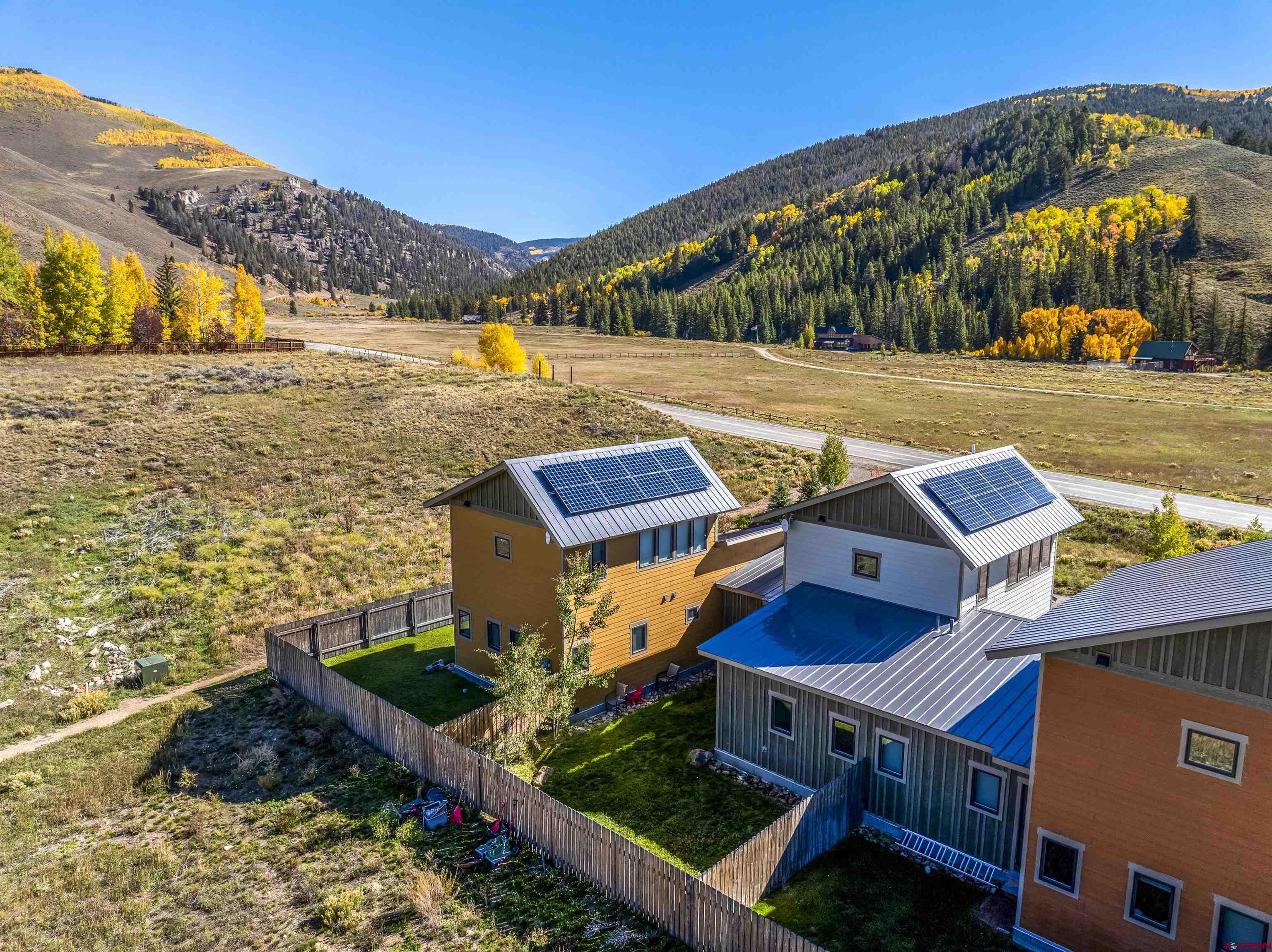 363 Cement Creek Road, Unit 3 Crested Butte, CO 81224 - Photo 24 of 34 a view of an ocean with city