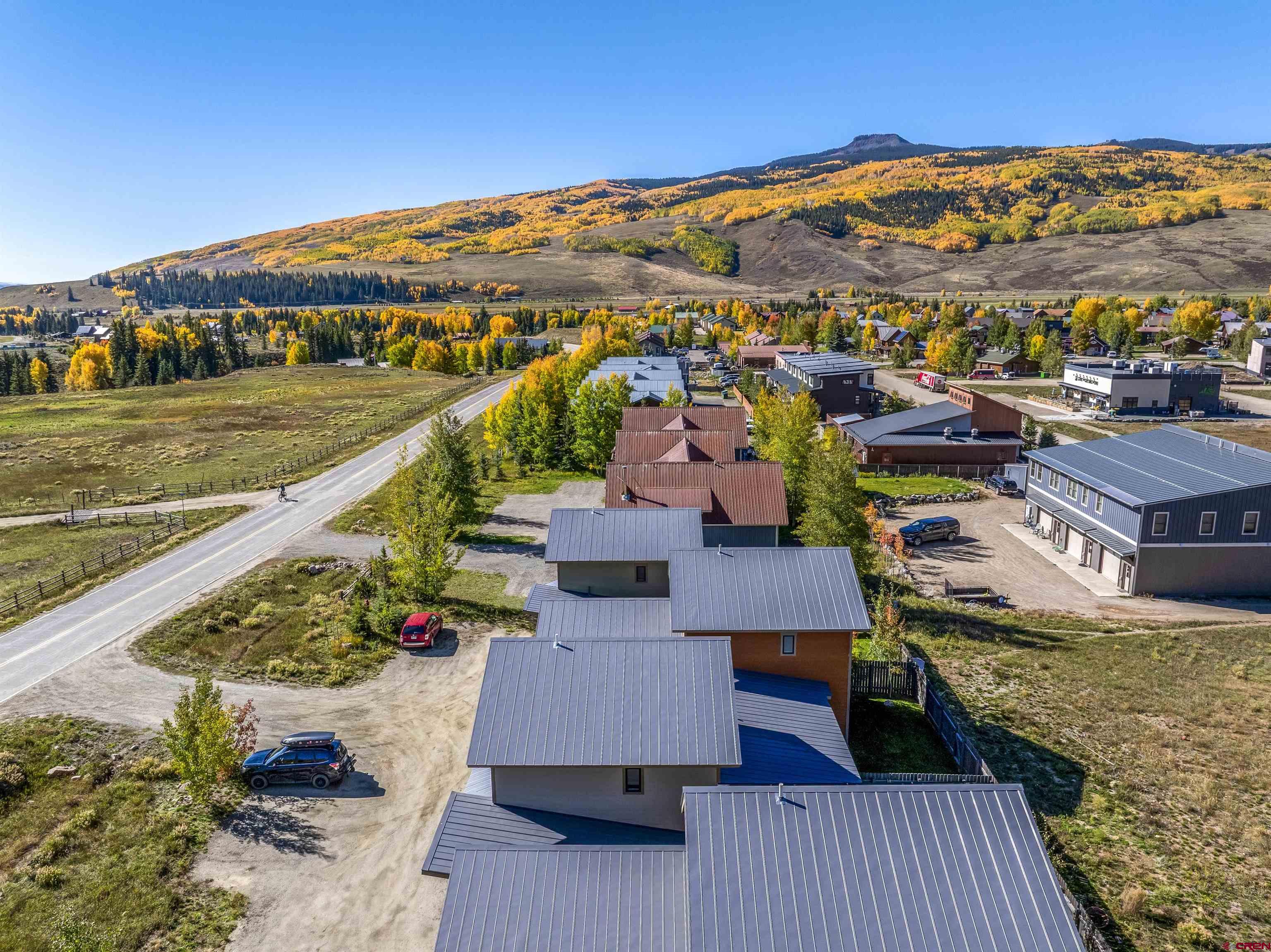 363 Cement Creek Road, Unit 3 Crested Butte, CO 81224 - Photo 28 of 34 a view of a city with an ocean view