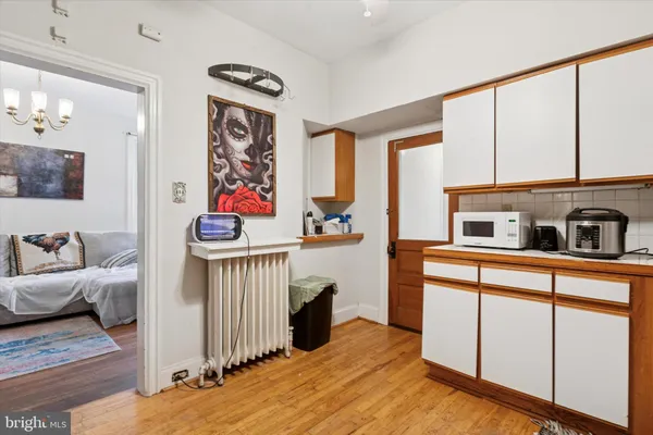 a bedroom with furniture and window
