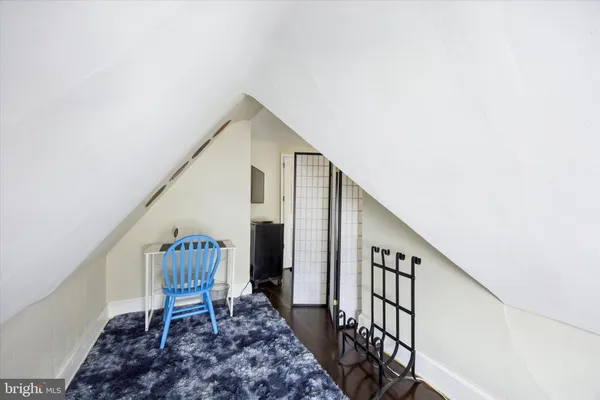 a bathroom with a shower toilet and sink
