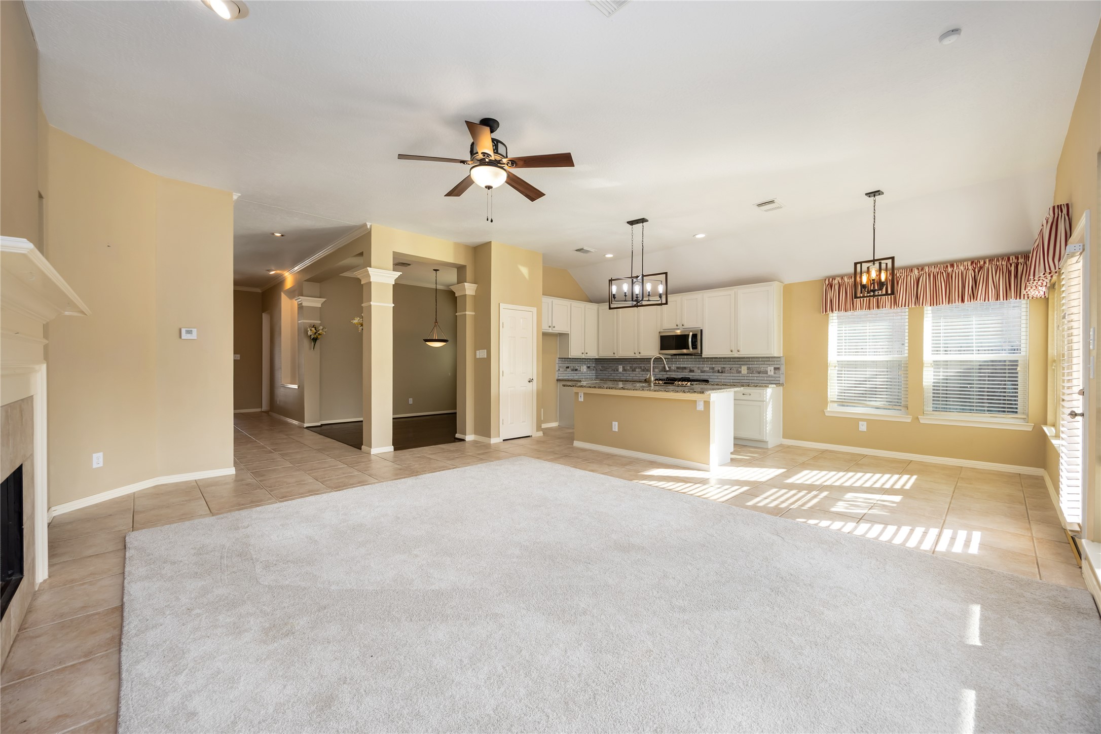 25619 Myrtle Springs Spring, TX 77373 - Photo 11 of 29 a view of a kitchen with a sink and a window