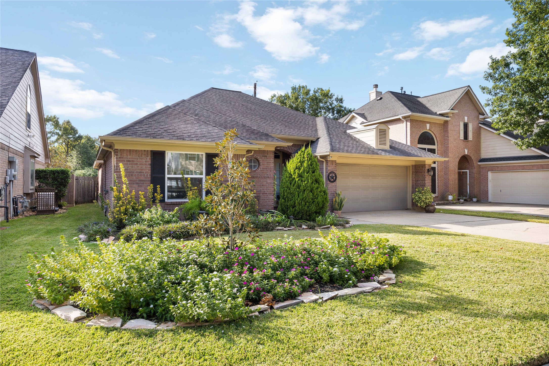 25619 Myrtle Springs Spring, TX 77373 - Photo 2 of 29 a front view of a house with a yard