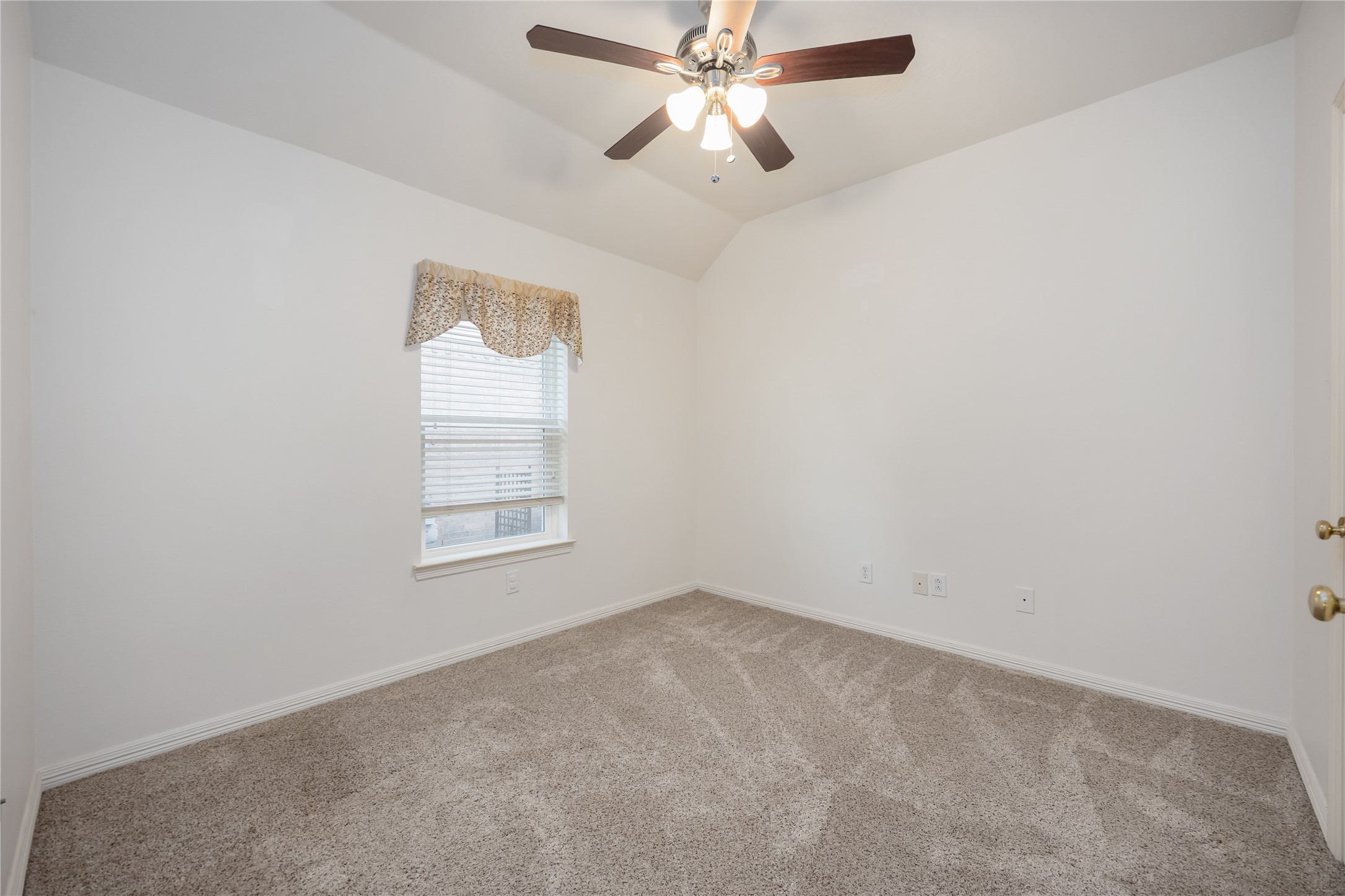 25619 Myrtle Springs Spring, TX 77373 - Photo 24 of 29 an empty room with a window and a fan