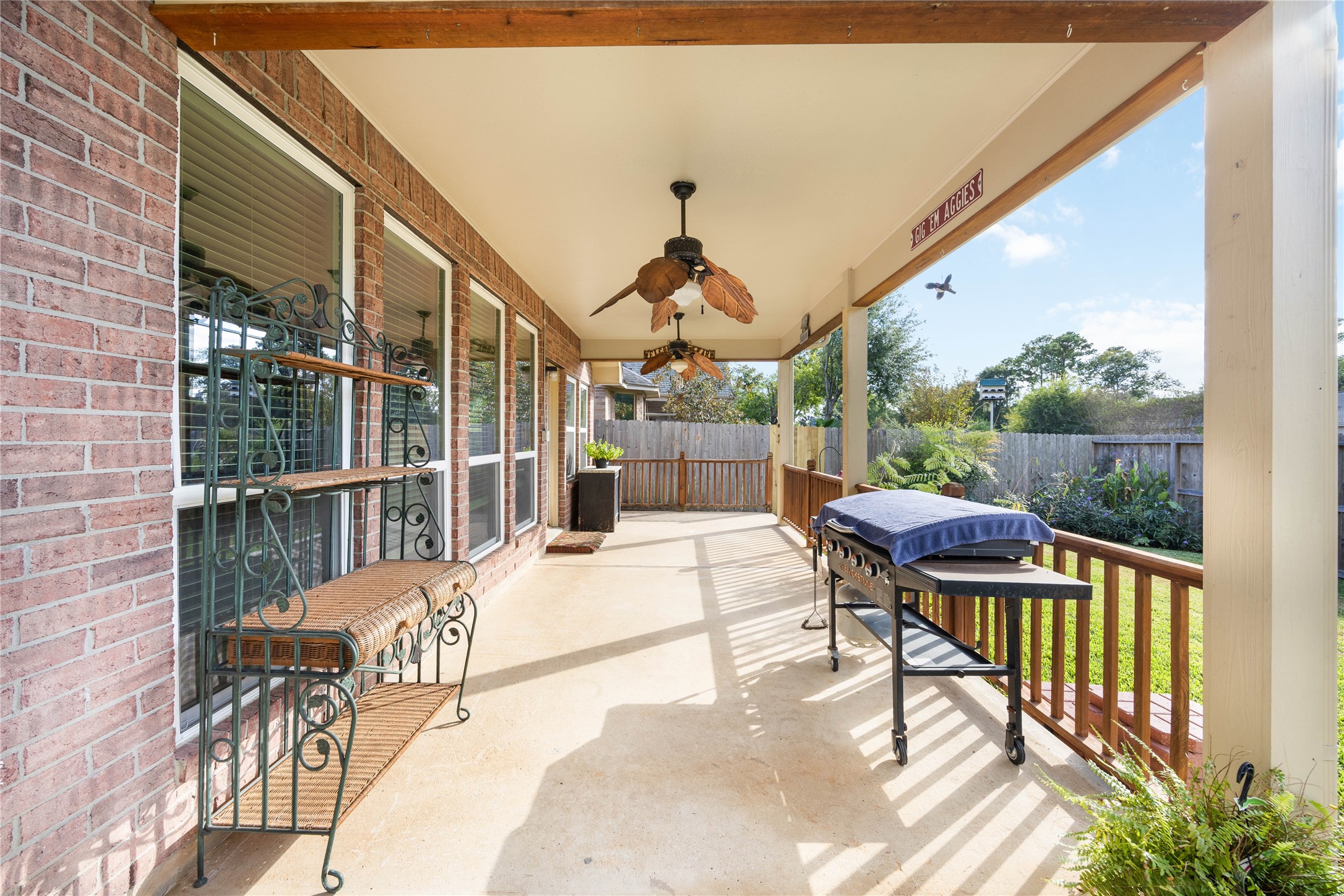 25619 Myrtle Springs Spring, TX 77373 - Photo 27 of 29 a view of a patio with a table and chairs