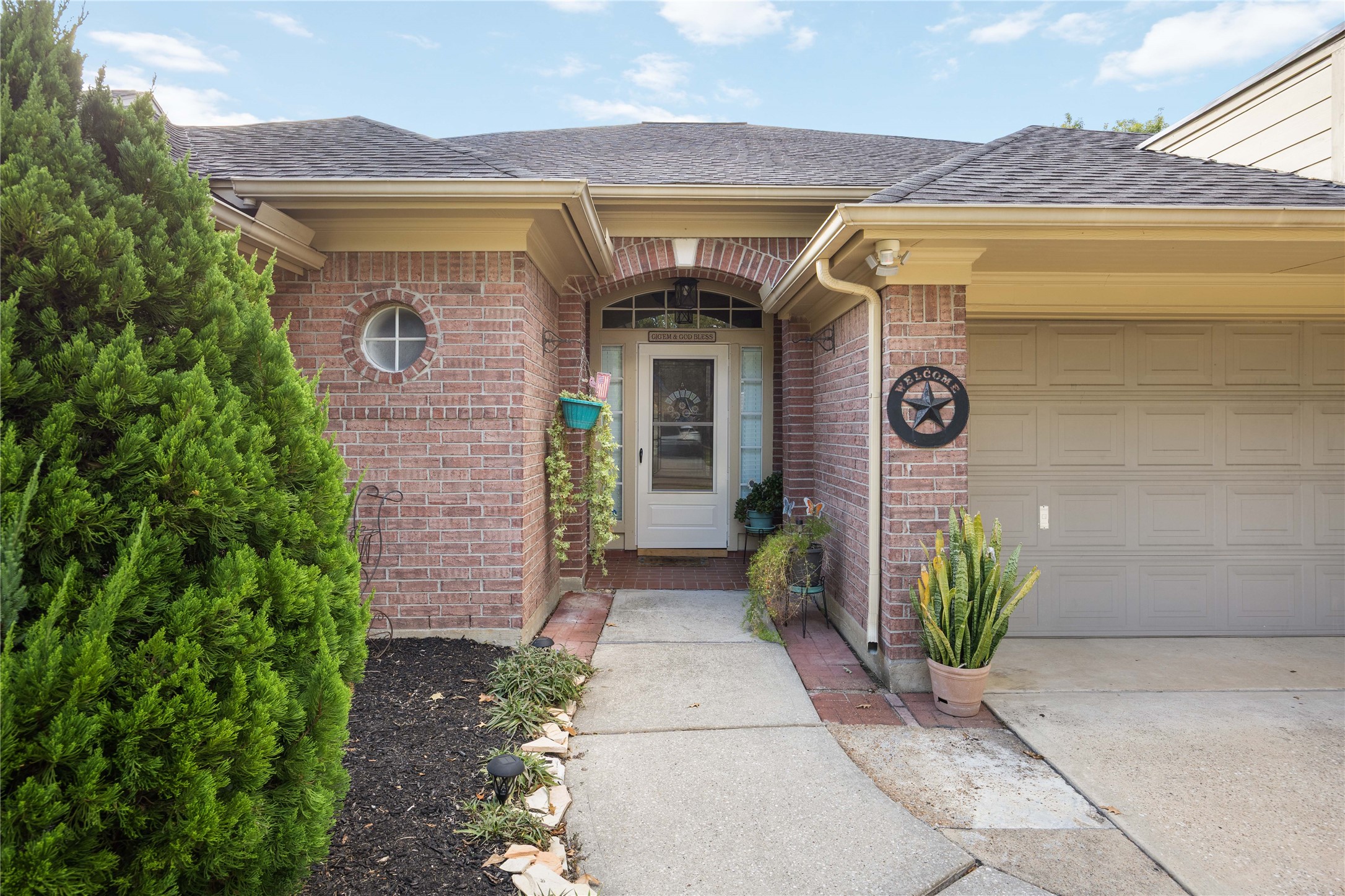25619 Myrtle Springs Spring, TX 77373 - Photo 4 of 29 a front view of a house with garden