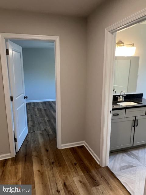 215 East Linden Street, Unit 4 Kennett Square, PA 19348 - Photo 13 of 23 a bathroom with a sink and a mirror