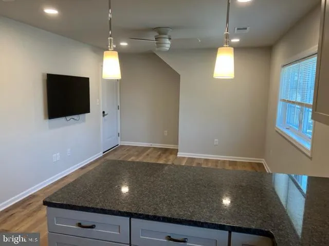 a view of a livingroom with a flat screen tv