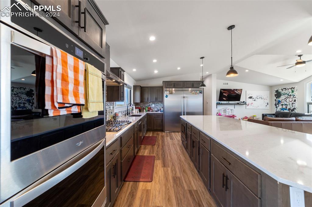 38640 Jones Road Rush, CO 80833 - Photo 11 of 41 a large kitchen with stainless steel appliances lots of counter space and a large window