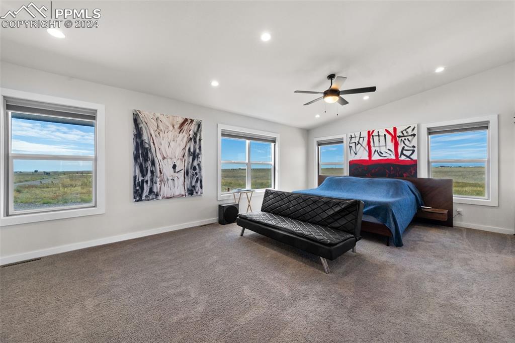 38640 Jones Road Rush, CO 80833 - Photo 15 of 41 a living room with furniture a ceiling fan and a window