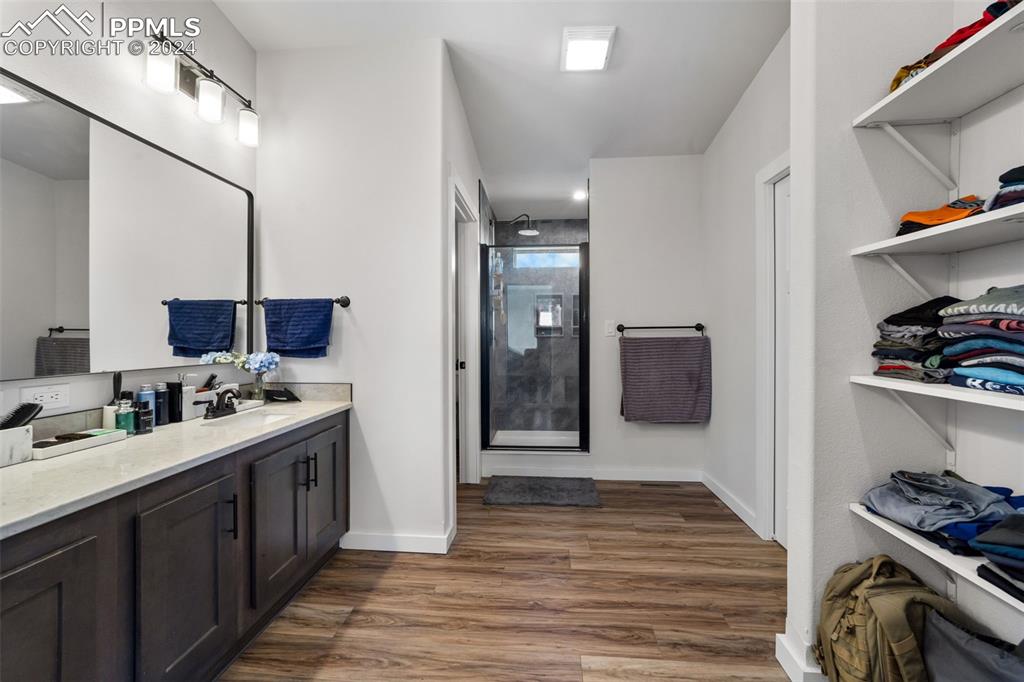 38640 Jones Road Rush, CO 80833 - Photo 18 of 41 a kitchen with a sink and wooden floor