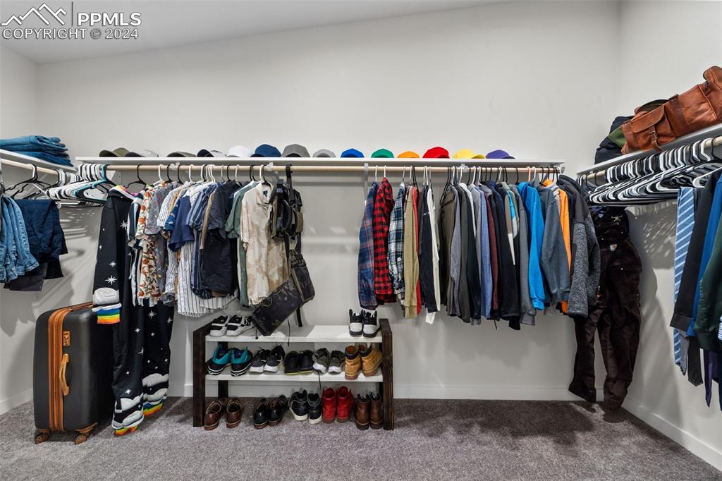 38640 Jones Road Rush, CO 80833 - Photo 19 of 41 a view of walk in closet with clothes