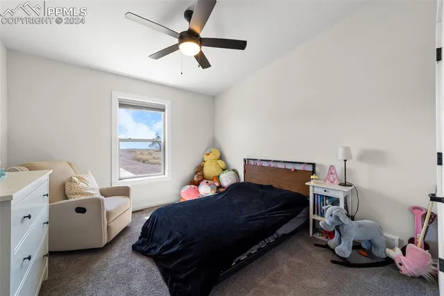 a kitchen with a sink appliances and cabinets