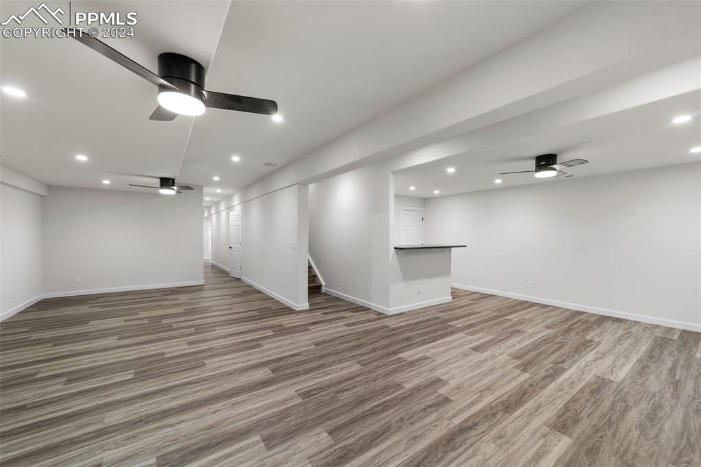 38640 Jones Road Rush, CO 80833 - Photo 27 of 41 an empty room with wooden floor and windows