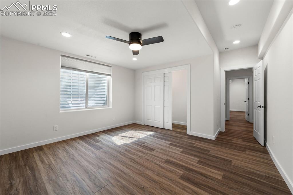 38640 Jones Road Rush, CO 80833 - Photo 35 of 41 wooden floor in an empty room with a window